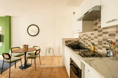 Cuisine ou kitchenette dans l'établissement Le Goupil