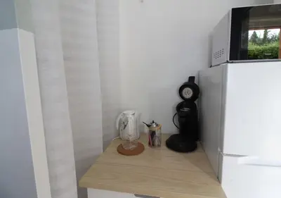 Cuisine ou kitchenette dans l'établissement Escapade Jurassienne-Terrasse & Sérénité