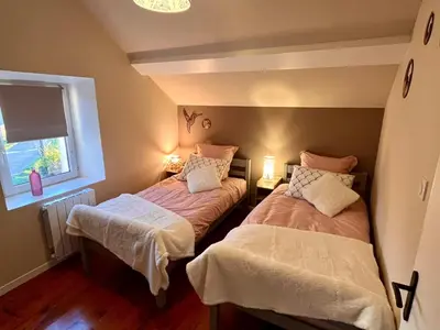 Un ou plusieurs lits dans un hébergement de l'établissement La Maisonnette de Chevannes