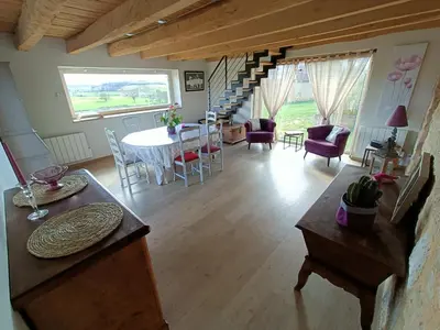 Coin salon dans l'établissement Maison de vacances à la campagne