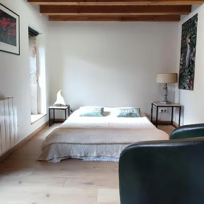 Un ou plusieurs lits dans un hébergement de l'établissement Maison de vacances à la campagne