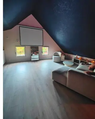 Coin salon dans l'établissement LOVEROOM - Le pavillon des arômes