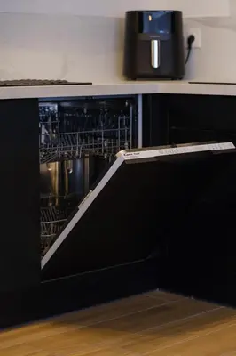 Cuisine ou kitchenette dans l'établissement Maison spacieuse au calme - parking privé - 8 personnes