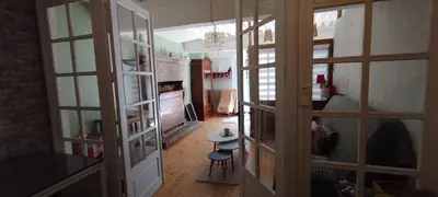 Télévision ou salle de divertissement dans l'établissement Jura entre Lacs et Montagnes Charmant studio cosy de 38 m2