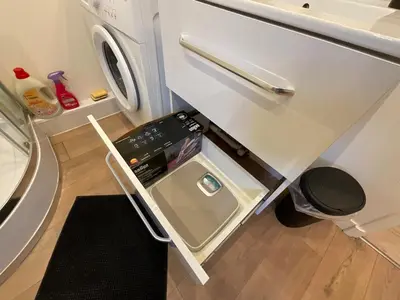 Cuisine ou kitchenette dans l'établissement La Petite Maison en Ville