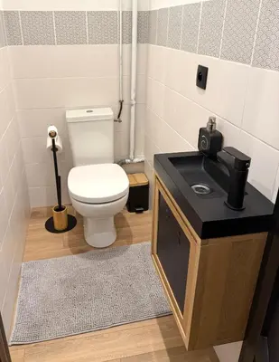 Salle de bains dans l'établissement La Chouette