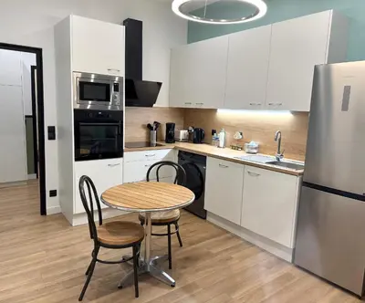 Cuisine ou kitchenette dans l'établissement La Chouette