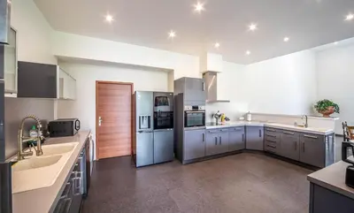 Cuisine ou kitchenette dans l'établissement Le Verger Secret