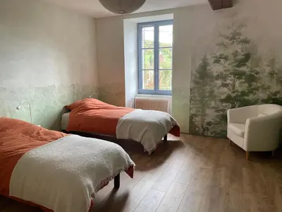 Un ou plusieurs lits dans un hébergement de l'établissement Cense des Possibles - chambre Forêt 4 personnes