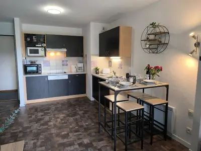 Cuisine ou kitchenette dans l'établissement Gîte Le 47