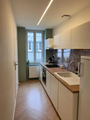 Cuisine ou kitchenette dans l'établissement Le scandinave