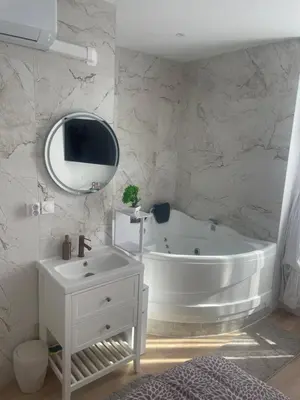 Salle de bains dans l'établissement Appartement Jacuzzi proche Cité Gastronomique