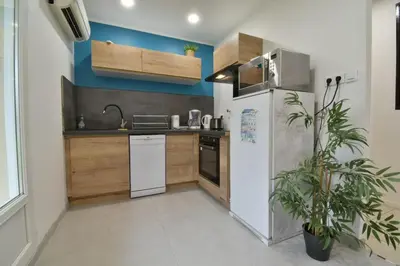 Cuisine ou kitchenette dans l'établissement Appartement Le 16 pour 7 personnes