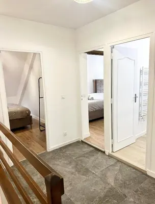 Un ou plusieurs lits dans un hébergement de l'établissement Le Relais Terrace and Charm of Paray 10 personnes
