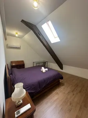 Un ou plusieurs lits dans un hébergement de l'établissement Le Relais Terrace and Charm of Paray 10 personnes