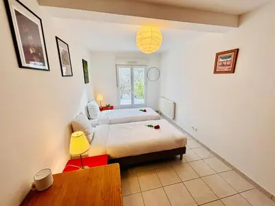 Un ou plusieurs lits dans un hébergement de l'établissement Maison de Charme - Proche gare - Le Creusot