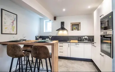Cuisine ou kitchenette dans l'établissement La Grange de Gigi