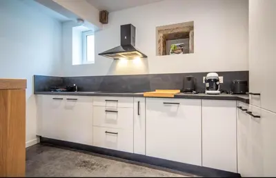 Cuisine ou kitchenette dans l'établissement La Grange de Gigi