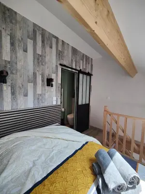 Un ou plusieurs lits dans un hébergement de l'établissement Ateliers des rêves - climatisé, Dijon centre