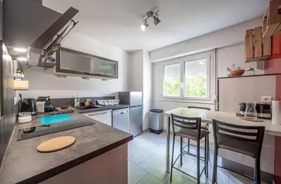 Cuisine ou kitchenette dans l'établissement Les Lauriers