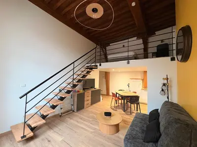 Coin salon dans l'établissement La Diligence - Logement climatisé au coeur de Dijon