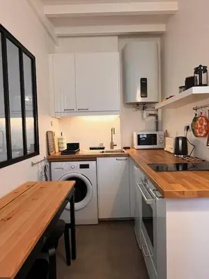 Cuisine ou kitchenette dans l'établissement Le charmant Rousseau