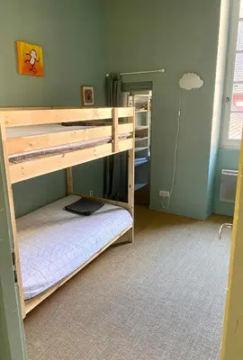 Un ou plusieurs lits dans un hébergement de l'établissement Le Verrerie with 2 bedrooms, Historic Center