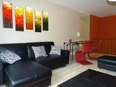 Coin salon dans l'établissement Ces Jours À Pommard