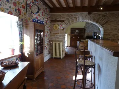 Coin salon dans l'établissement Le Gîte des Fontaines au cœur de la Bourgogne