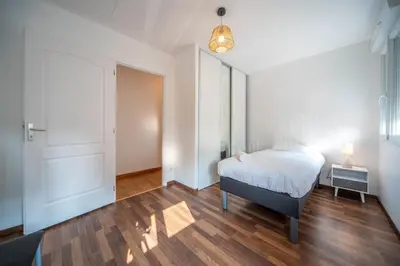 Un ou plusieurs lits dans un hébergement de l'établissement Spacieux logement près de Chalon