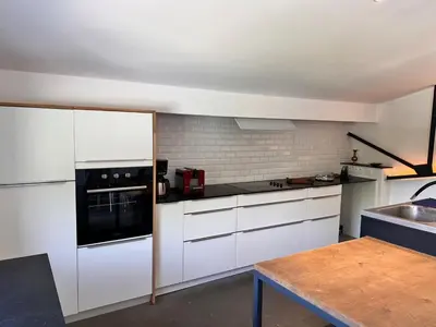 Cuisine ou kitchenette dans l'établissement le gite de l'atelier