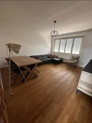 Coin salon dans l'établissement Appartement spacieux