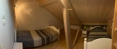 Un ou plusieurs lits dans un hébergement de l'établissement Maison 14 personnes, Arbois, Gîte du Dérochoir