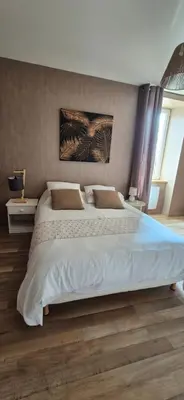 Un ou plusieurs lits dans un hébergement de l'établissement Gîte Le repos du voyageur