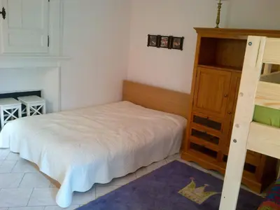 Un ou plusieurs lits dans un hébergement de l'établissement Maison Individuelle Les Templiers