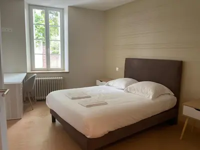 Un ou plusieurs lits dans un hébergement de l'établissement Collection Verneuil - Paray-le-Monial