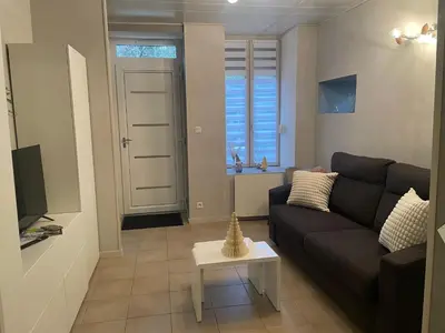 Coin salon dans l'établissement À l'improviste est une maison individuelle