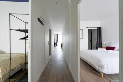 Un ou plusieurs lits dans un hébergement de l'établissement Villa Napoléon - Appart'hôtels au coeur d'Autun - Contact Hôtels