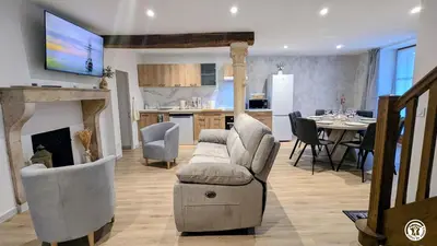 Coin salon dans l'établissement Une Douce Parenthèse