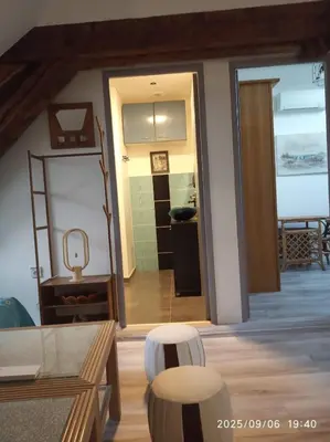 Coin salon dans l'établissement Grand duplex en centre ville pour 10 personnes et plus