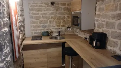 Cuisine ou kitchenette dans l'établissement Luxury suite lilas 5