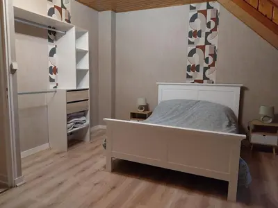 Un ou plusieurs lits dans un hébergement de l'établissement Country apartment