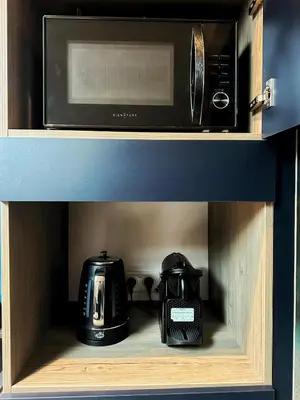 Cuisine ou kitchenette dans l'établissement L'annexe 3 - Cosy studio Dole