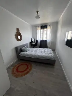 Un ou plusieurs lits dans un hébergement de l'établissement Large 3 bedroom cozy apartment