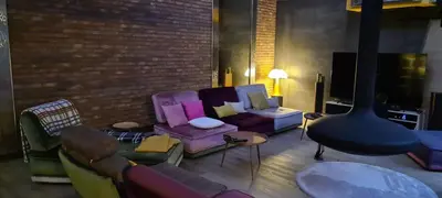 Coin salon dans l'établissement Loft 500M2