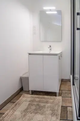 Salle de bains dans l'établissement Le Petit Bonheur