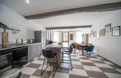 Cuisine ou kitchenette dans l'établissement Les Trésors de Givry