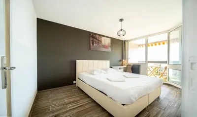 Un ou plusieurs lits dans un hébergement de l'établissement Appartement 3 chambres - Chalon