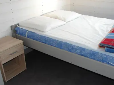 Un ou plusieurs lits dans un hébergement de l'établissement Chalet cosy avec terrasse, 5 personnes, cuisine équipée - API-1-52-1123