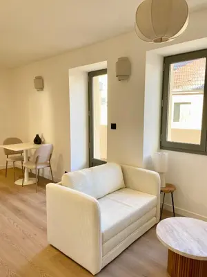 Coin salon dans l'établissement Appartement au pied des vignes avec terrasse